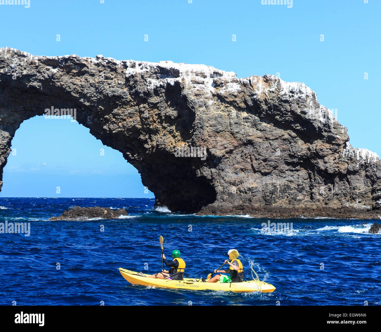 Kayakers by Arch Rock at Channel Islands National Park Stock Photo