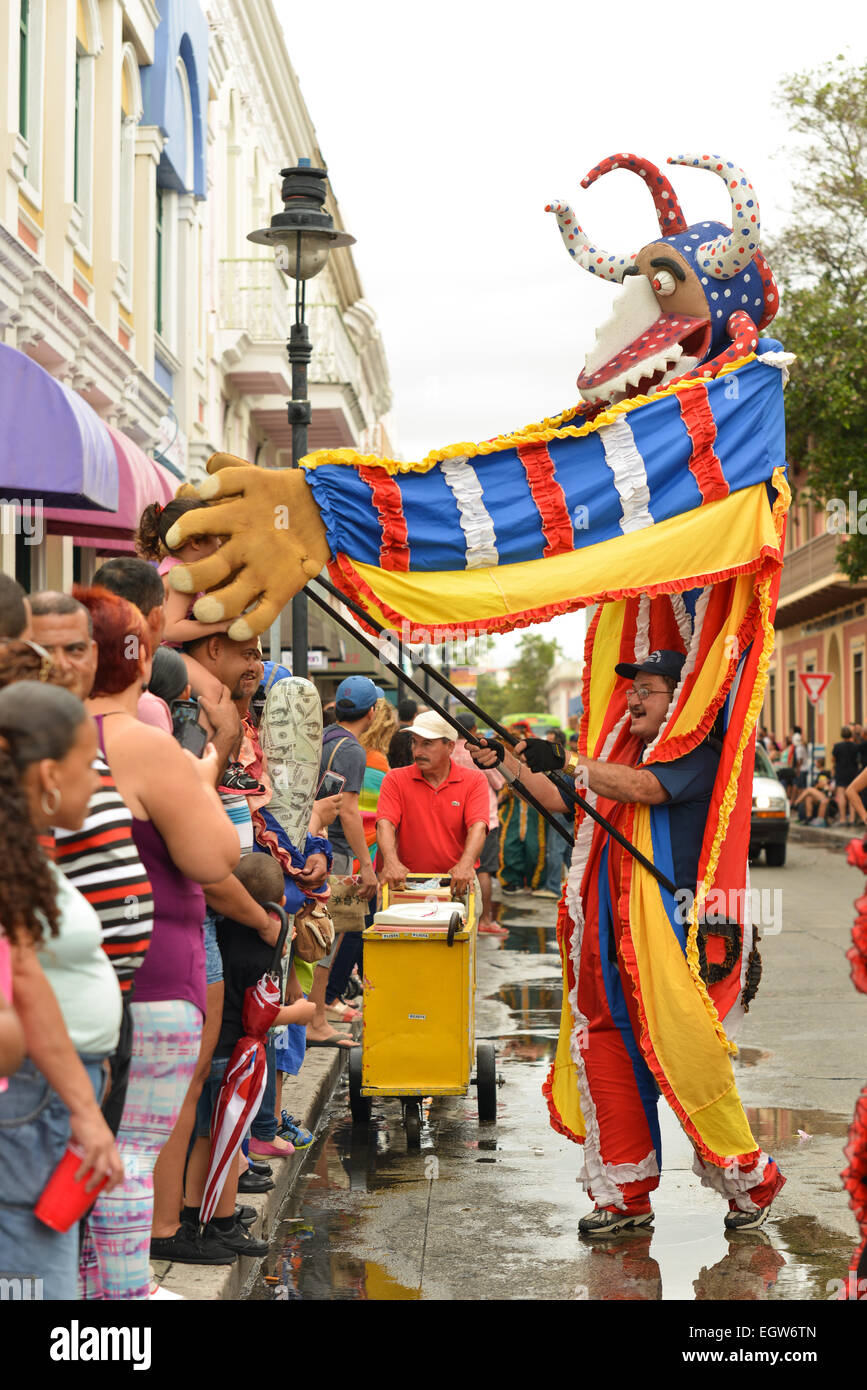 Masked cultural figure vejigante interacting with public during the carnival in Ponce, Puerto Rico 2015 Stock Photo