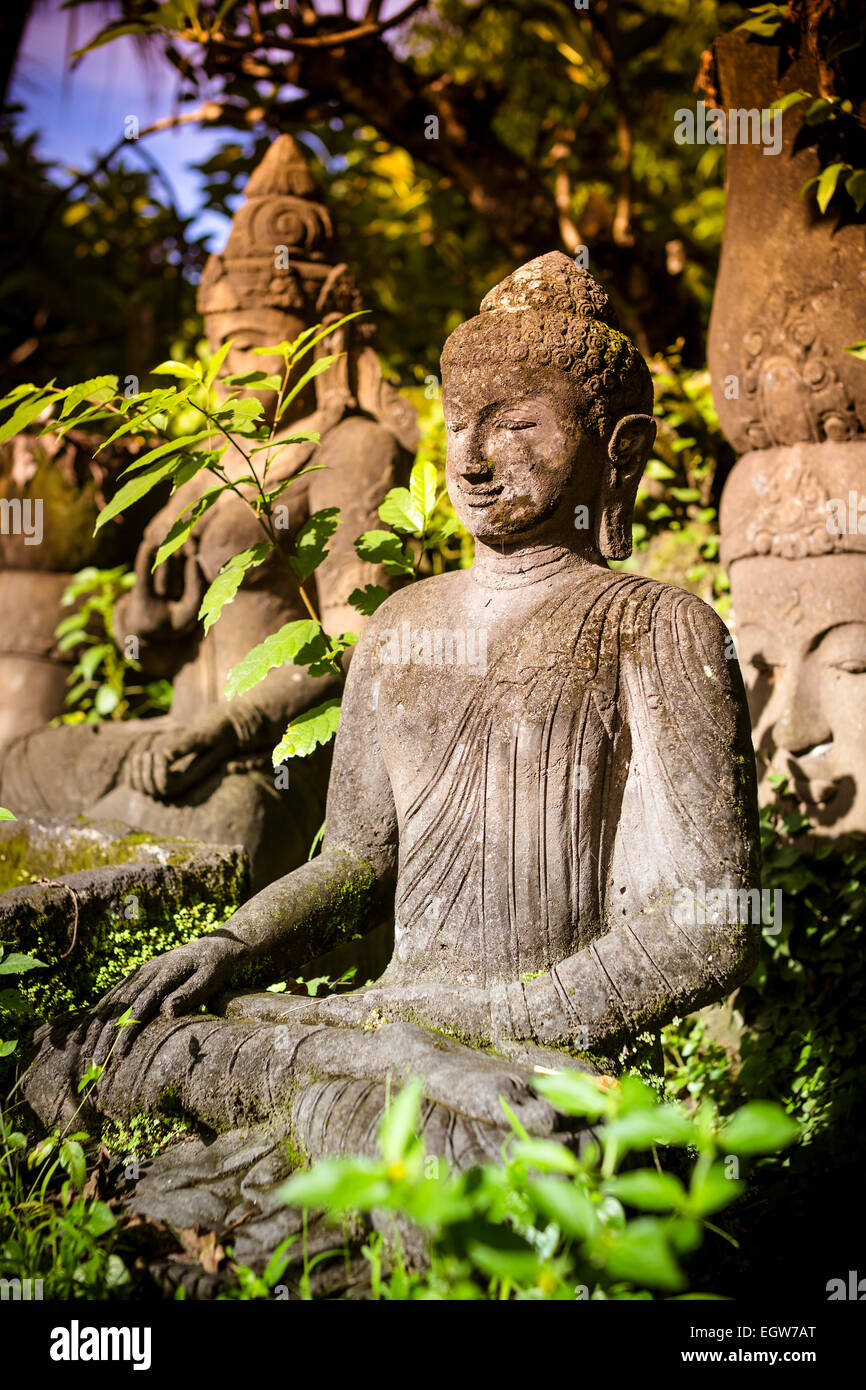 The old stone Buddha statue. Indonesia, Bali Stock Photo Alamy
