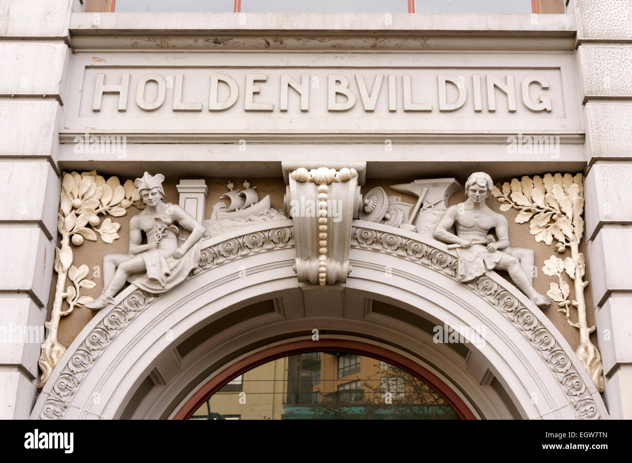 Decorated Romanesque arch of the Chicago-style Holden Building (1911) on East Hastings Street, Vancouver, BC, Canada Stock Photo