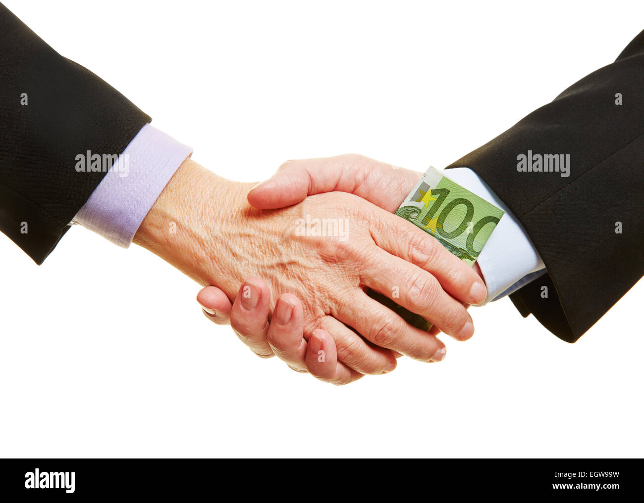 Hands giving Euro money bill for business bribery during handshake Stock Photo