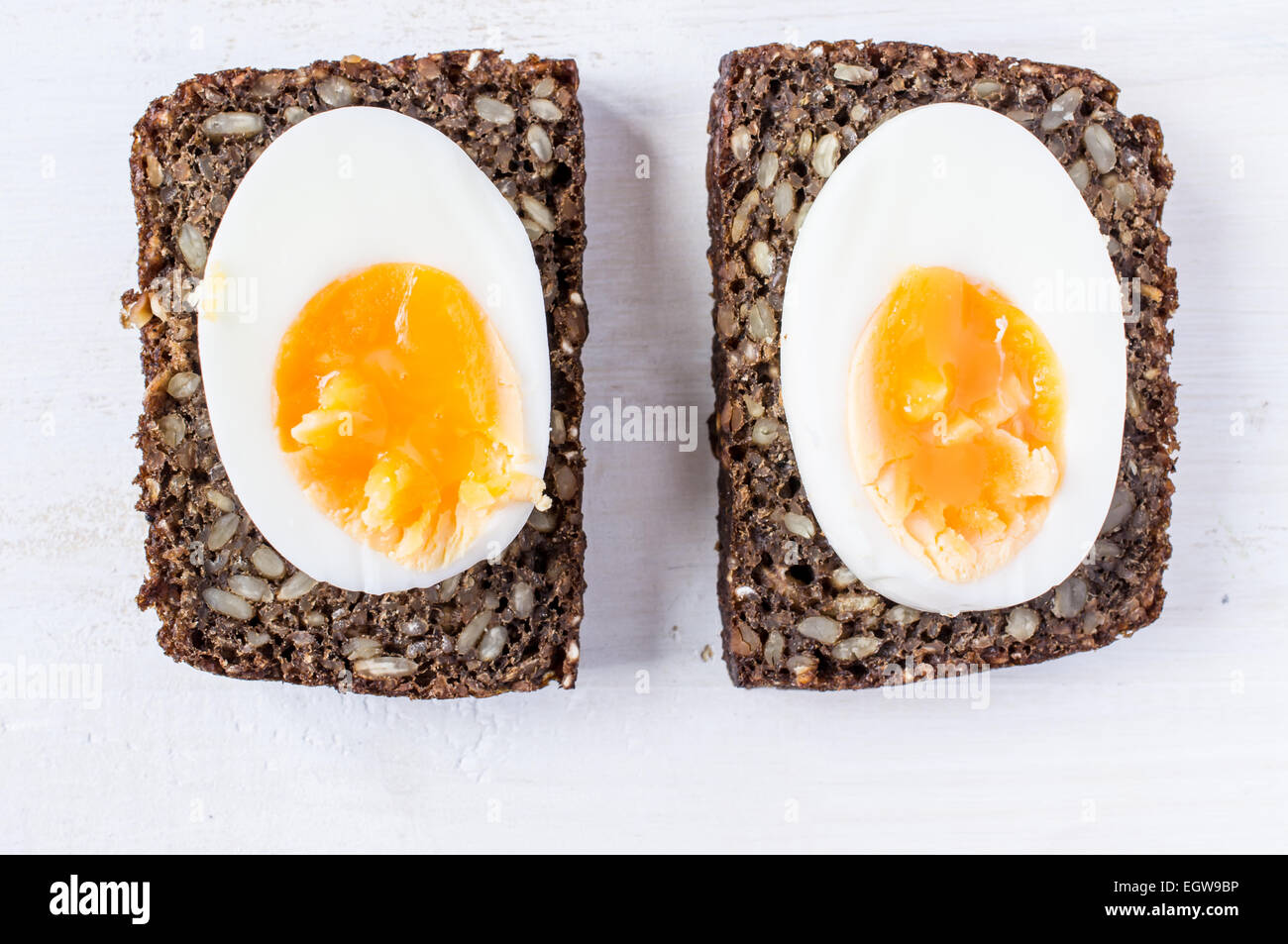 Hard boiled egg sandwich on a table Stock Photo - Alamy