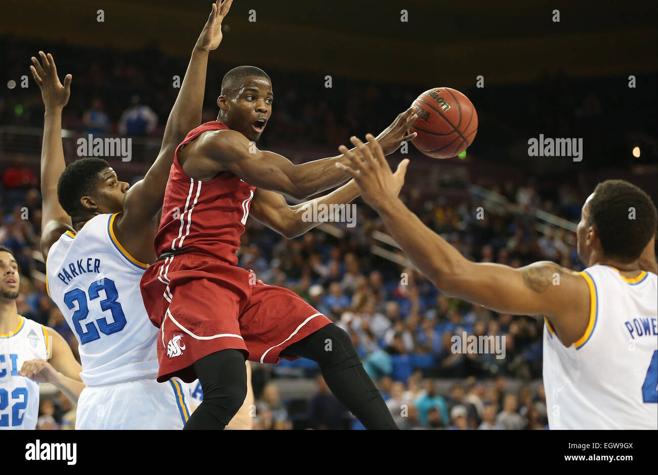 March 1, 2015: Washington State Cougars and UCLA Bruins, Pauley Pavilion in Los Angeles, CA. WSU guard Ike Iroegbu #0 cuts down the lane but decides to dish it after running into UCLA center Tony Parker #23. Stock Photo