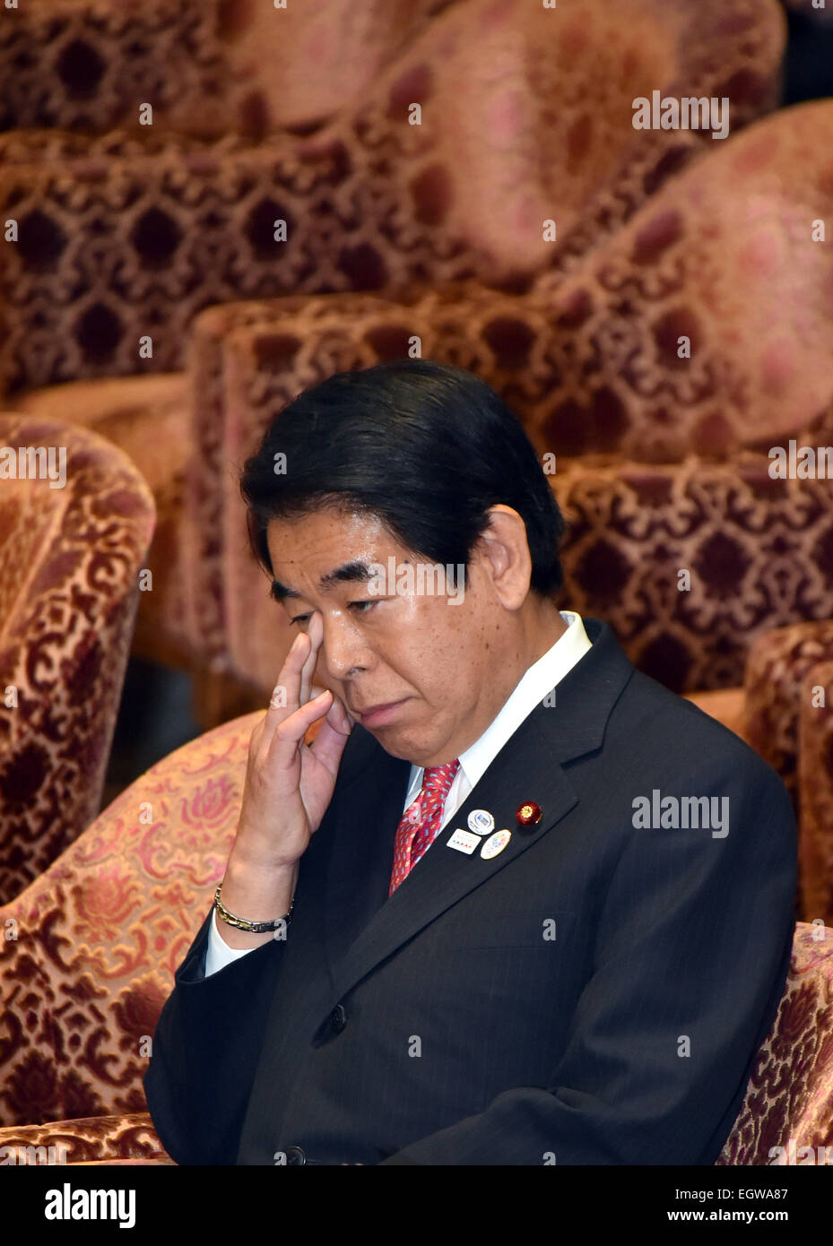 Tokyo, Japan. 3rd Mar, 2015. Education Minister Hakubun Shimomura is grilled by opposition lawmakers for his handling of political funds during a budget committee deliberation at the Diet's lower house in Tokyo on Tuesday, March 3, 2015. Shimomura denied any wrongdoing amid allegations that his regional support groups were not registered as political organizations. © Natsuki Sakai/AFLO/Alamy Live News Stock Photo