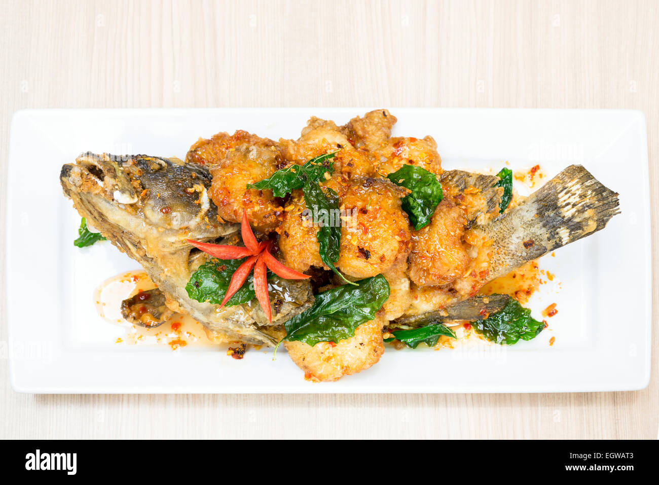 deep fried sweet and sour spicy sauce grouper fish Stock Photo Alamy