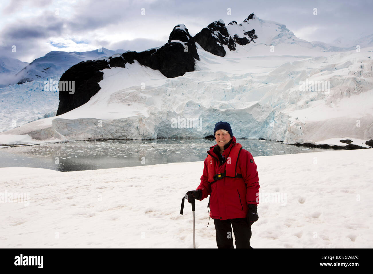Antarctica, Graham Land, Paradise Bay, visitor in front of glacier Stock Photo