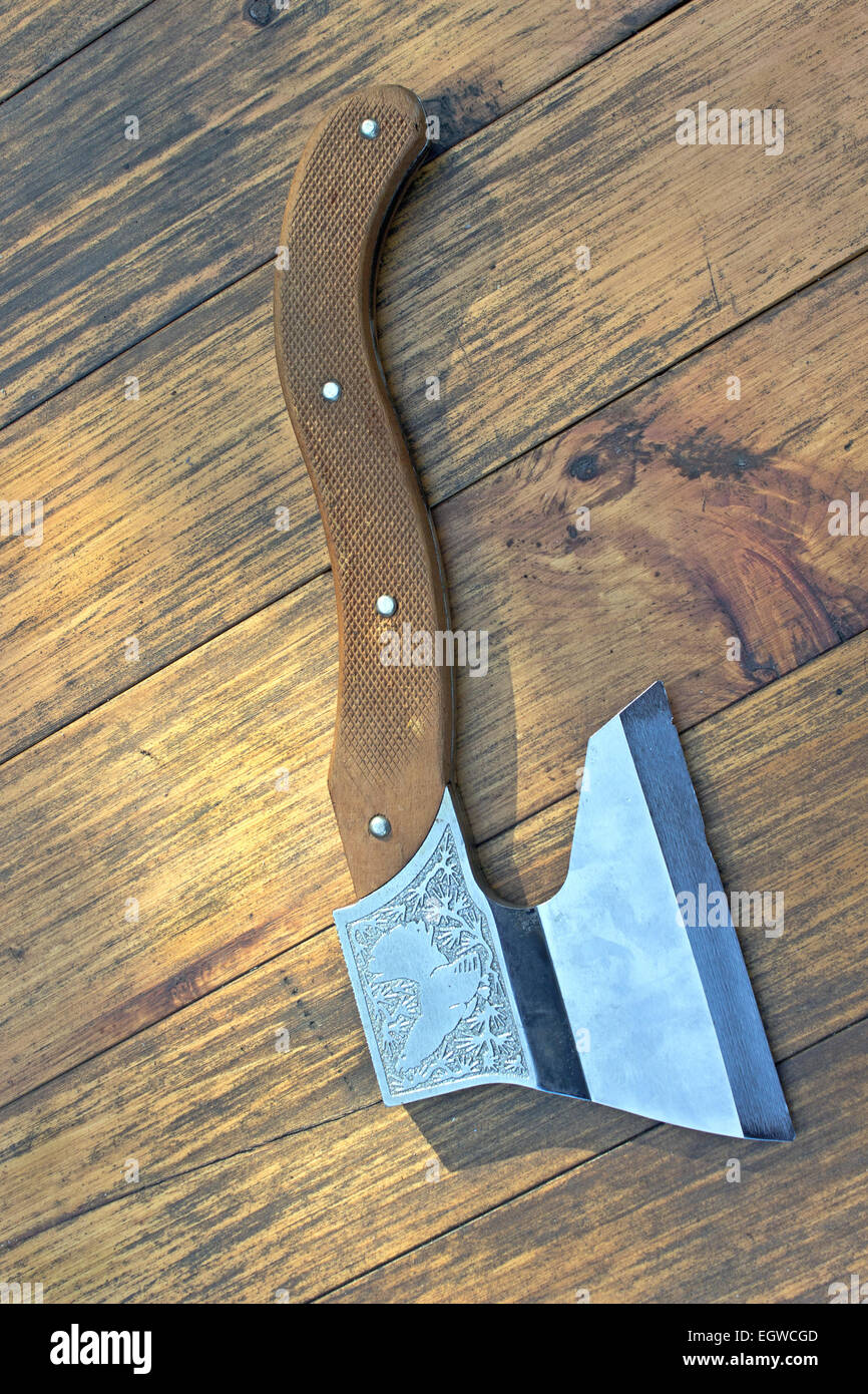 Old ax over wooden background Stock Photo