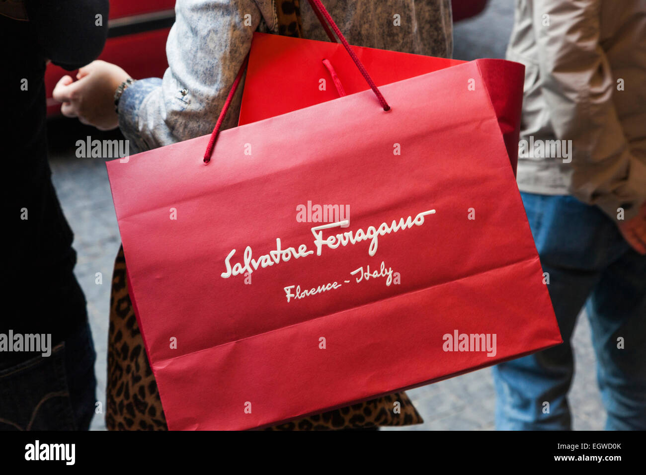 China, Hong Kong, Central, Shopper Carrying Salvatore Ferragamo Bag Stock Photo