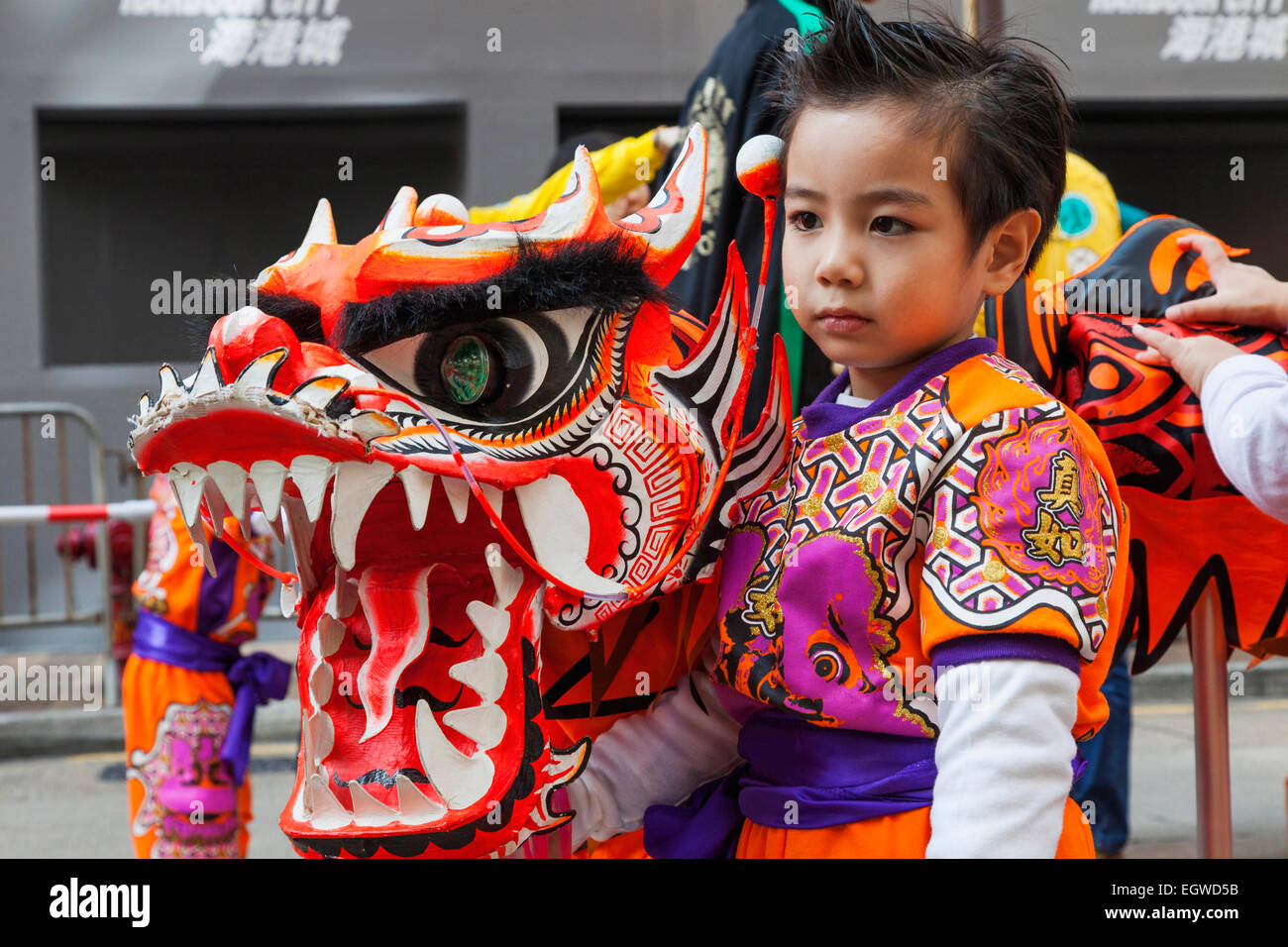 China, Hong Kong, Annual New Years Day Festival Parade, Child Holding