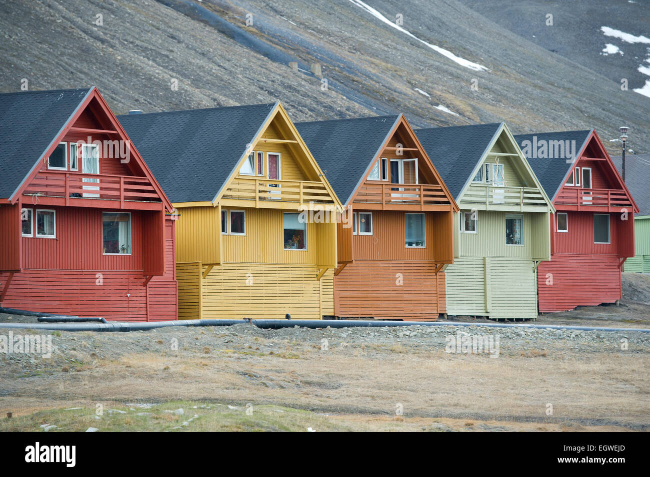 A row of colourful wooden Norwegian houses in the town of Longyearbyen