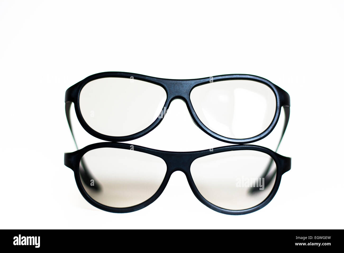 Couple of plastic glasses isolated on white standing one on the top of other Stock Photo Alamy