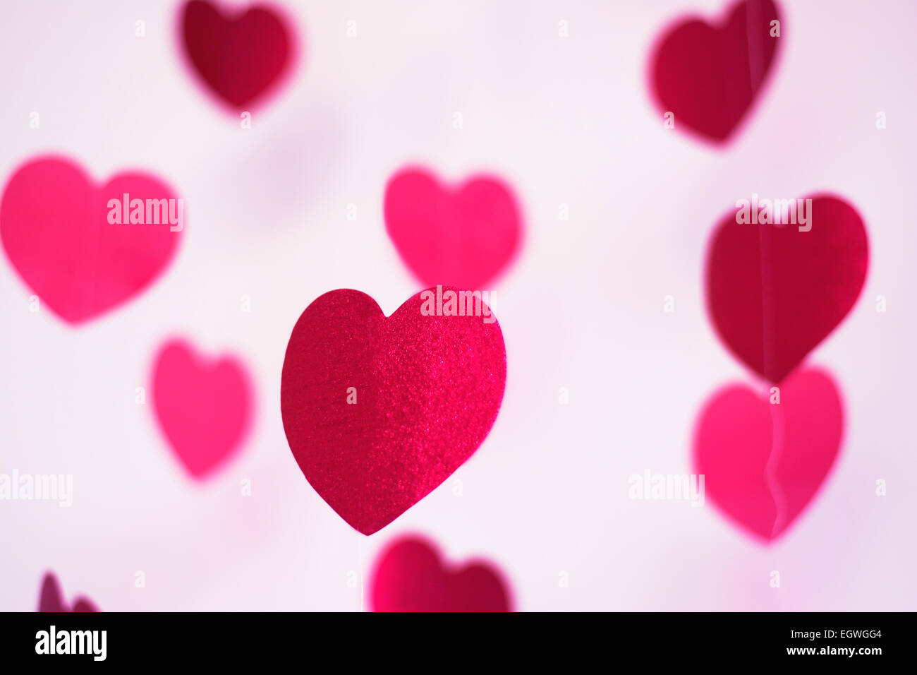 Valentine's day horizontal background with hanging hearts Stock Photo ...