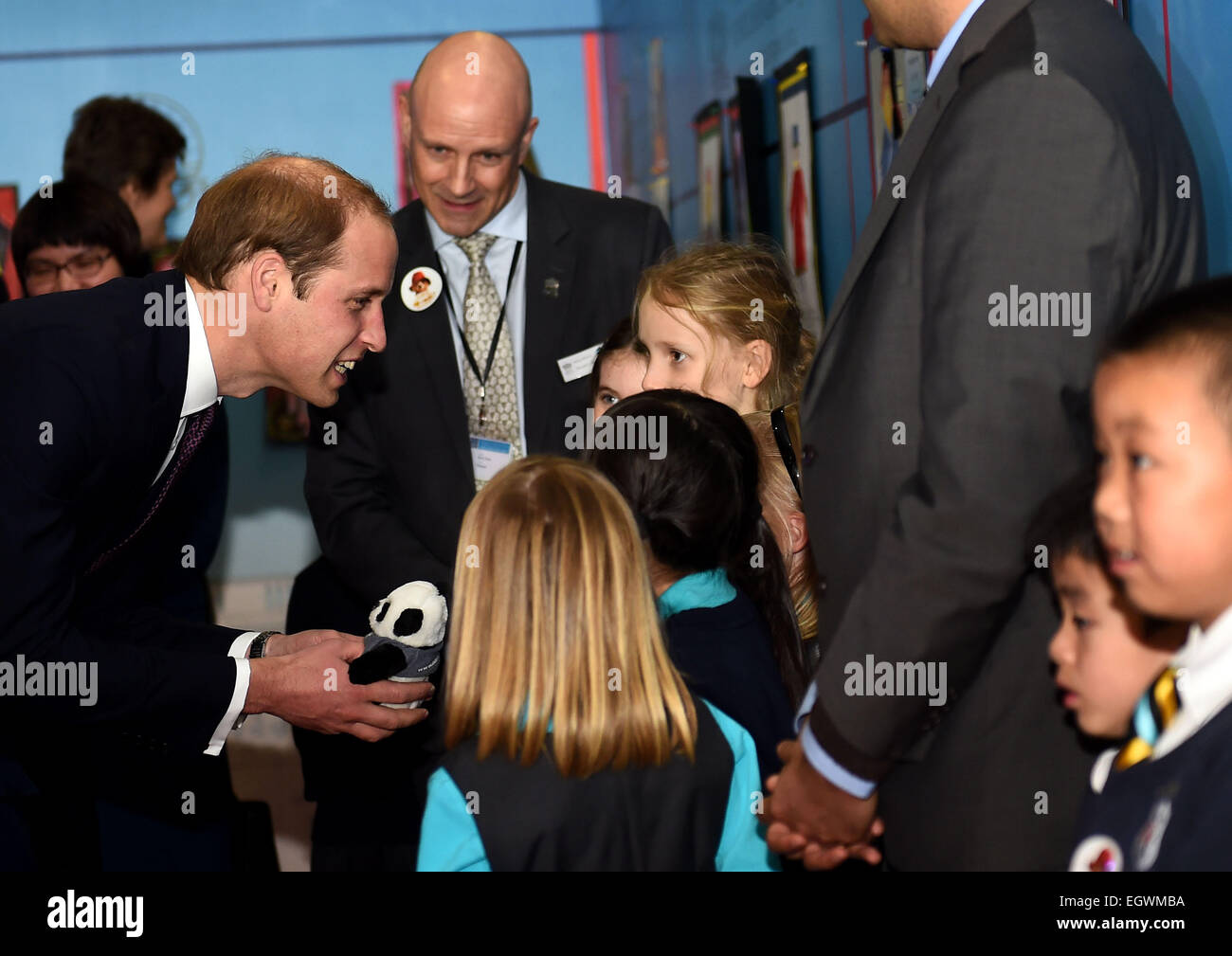 Shanghai, China. 3rd Mar, 2015. Britain's Prince William (L) receives a gift from a girl during the Chinese premiere of "Paddington" at Shanghai Film Museum in Shanghai, east China, March 3, 2015. Credit:  Jin Liangkuai/Xinhua/Alamy Live News Stock Photo