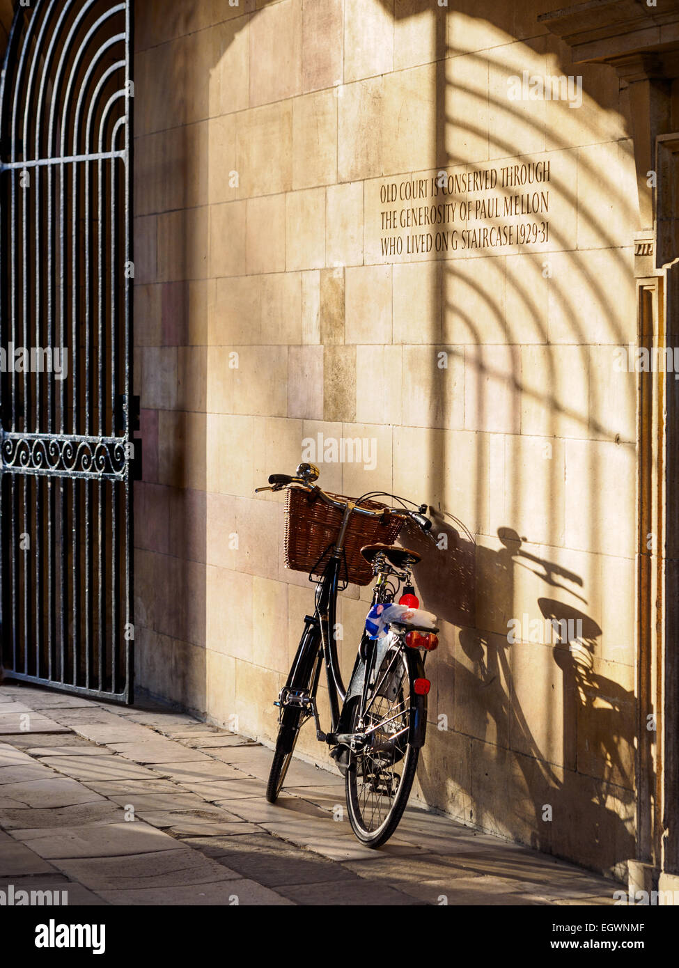 Clare College Cambridge Tourism Clare College - vintage style student bike parked in a picturesque gateway in Clare College, Cambridge UK Stock Photo