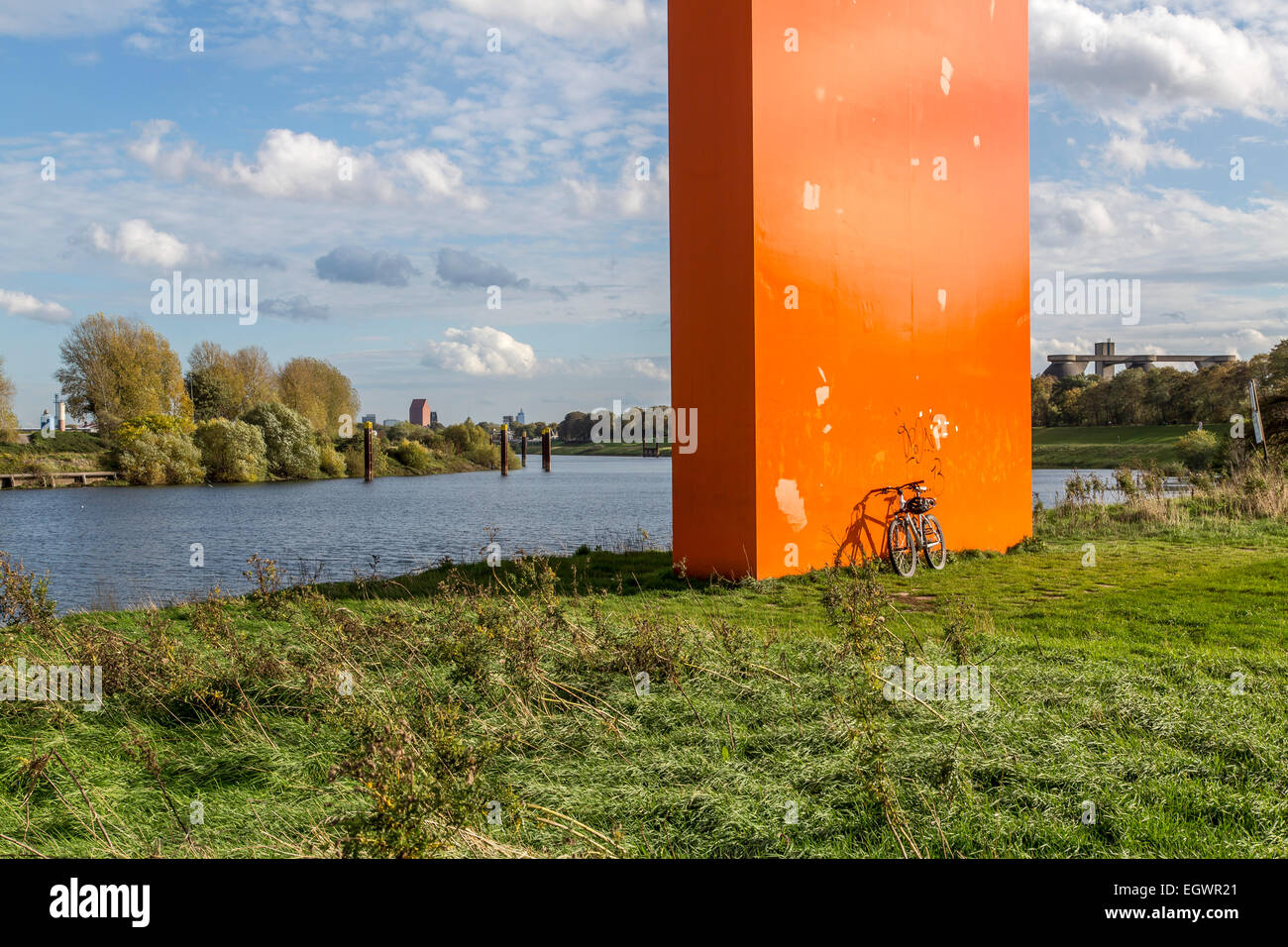 Estuary of river Ruhr into river Rhine, Duisburg, Germany, sculpture 'Rheinorange' Stock Photo