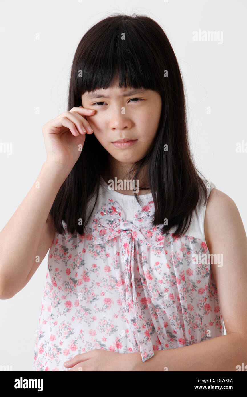 Chinese Girl With Sad Expression Stock Photo Alamy