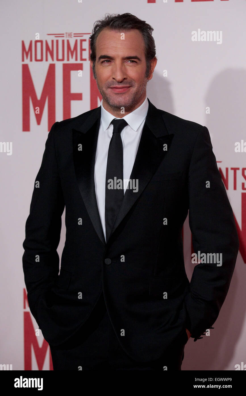 UNITED KINGDOM, London : French actor Jean Dujardin poses for a photo call in front of 'Cupid complaining to Venus' by Lucas Cranach which was a painting that belonged in Hitlers private collection, in conjunction with the film 'The Monument men' in central London on February 11, 2014 Stock Photo