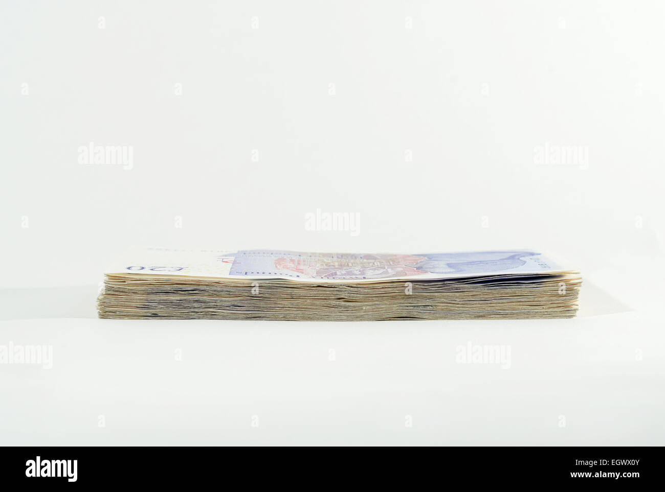 £1000 in £20 notes. A stack of 50 Twenty pound notes making a grand in cash Stock Photo