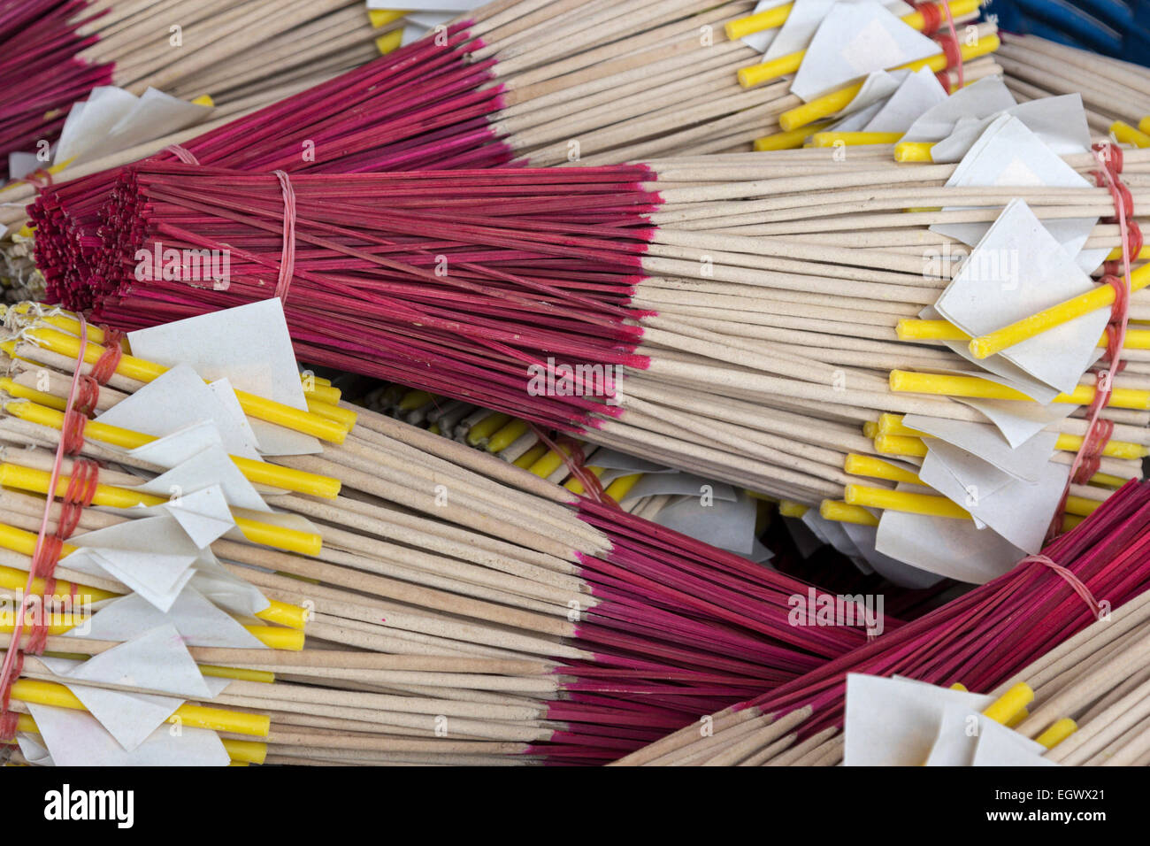 Colorful incenses sold on a floating market in Thailand Stock Photo