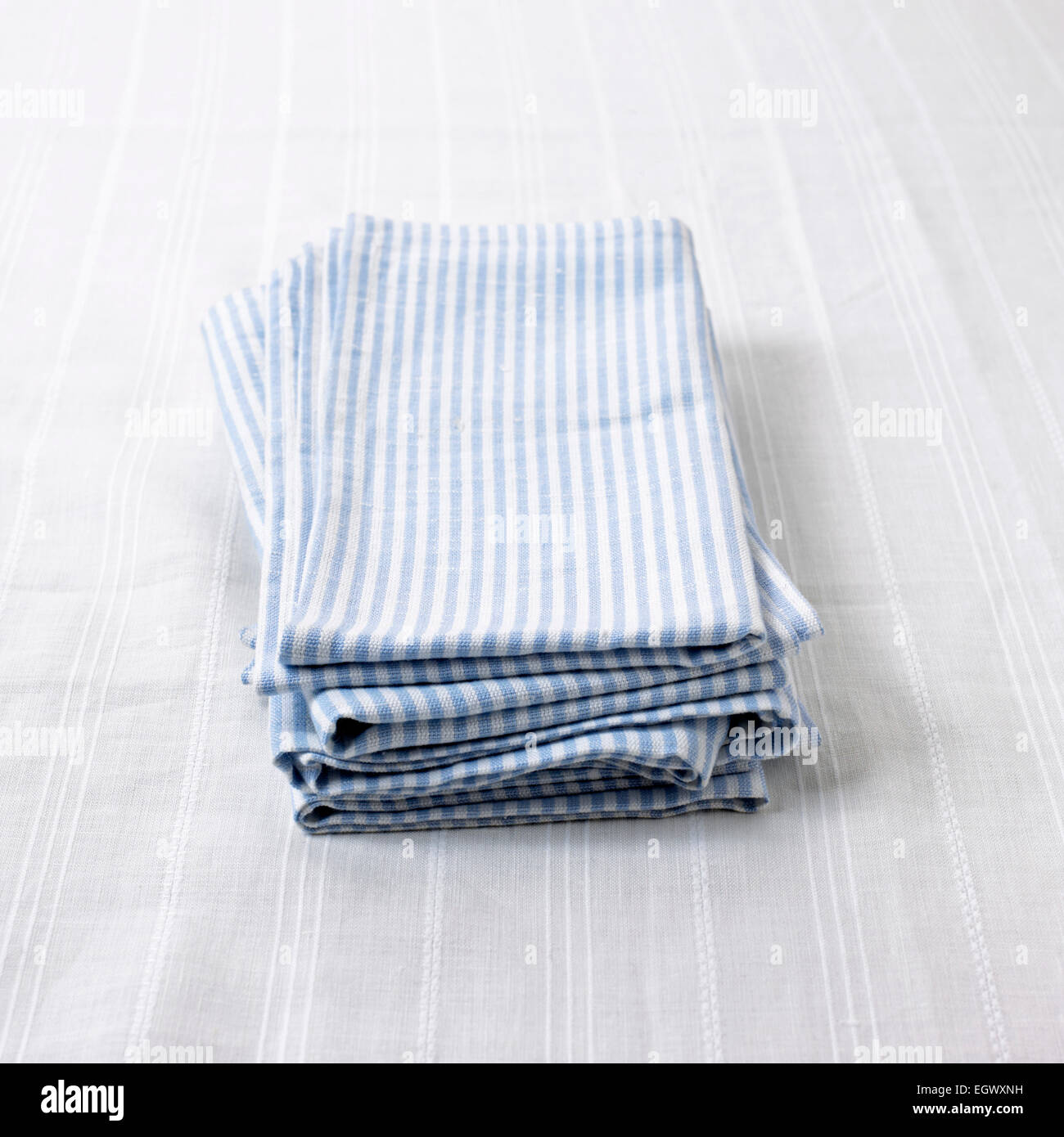 pile of blue and white striped napkins Stock Photo