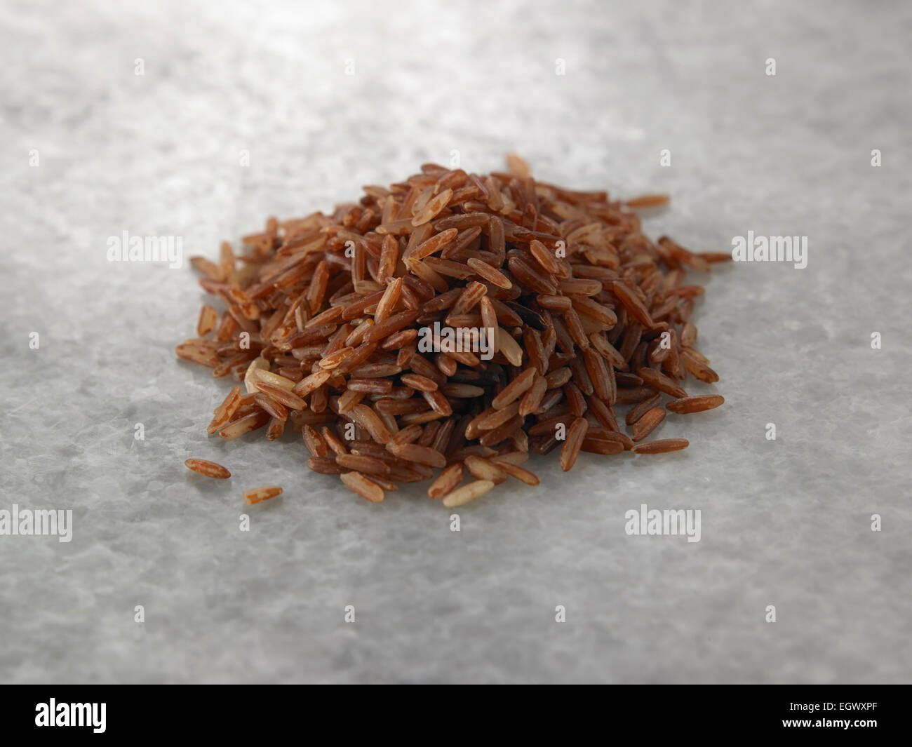 brown rice on the marble top Stock Photo - Alamy