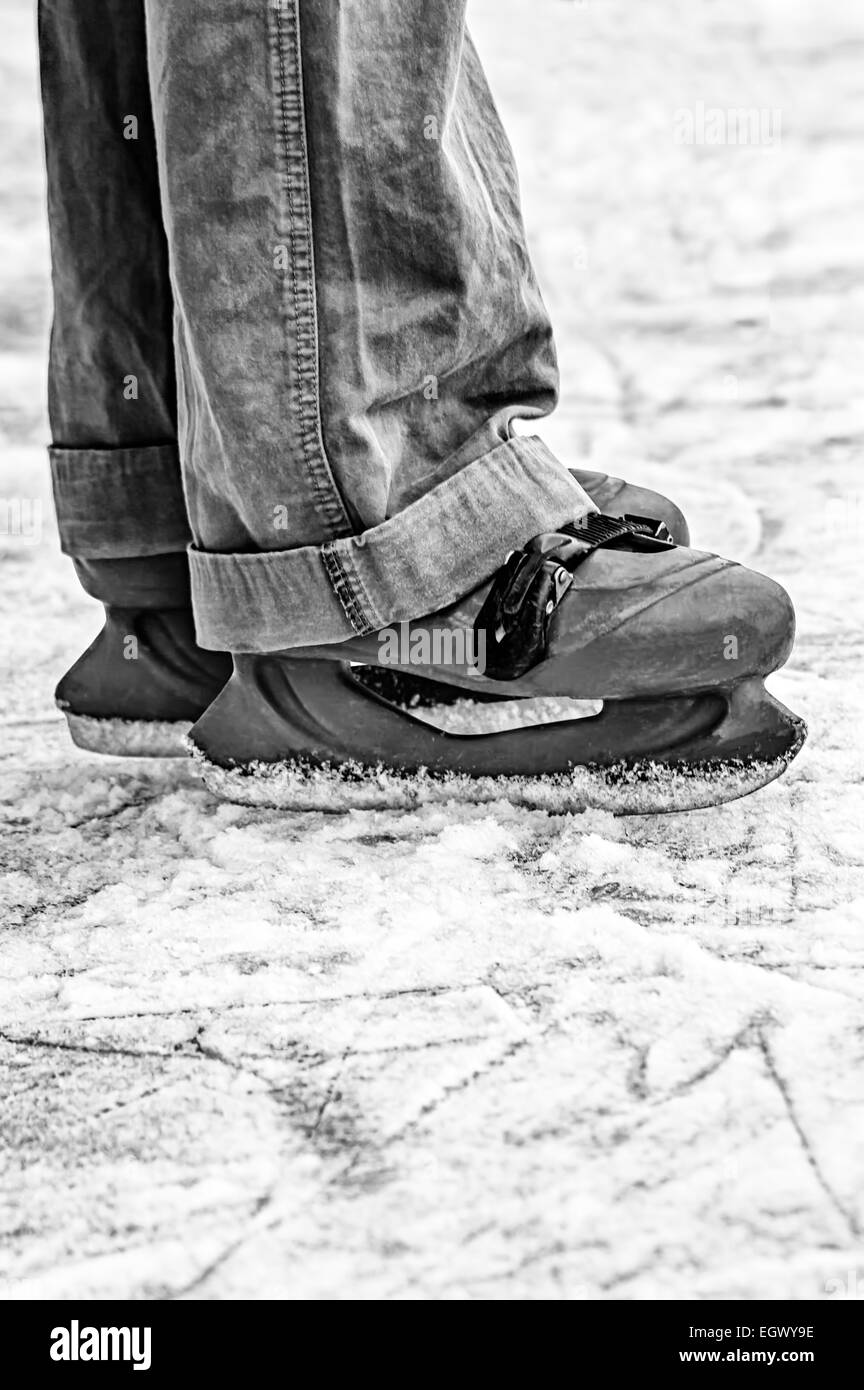 Wide skates on ice. Black and white image Stock Photo