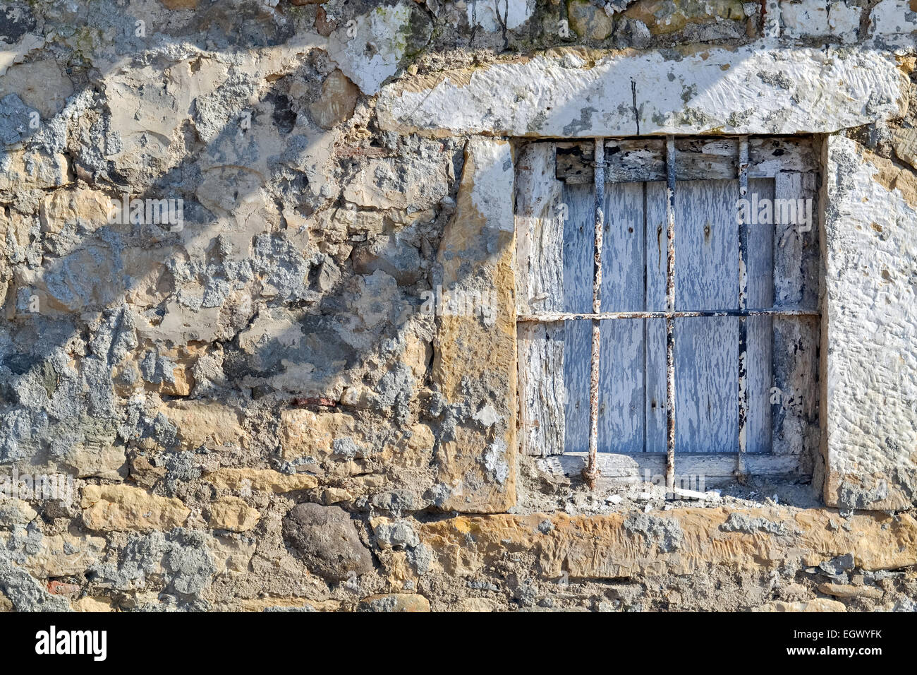 Ruined stone wall and window of an old abandoned house Stock Photo - Alamy