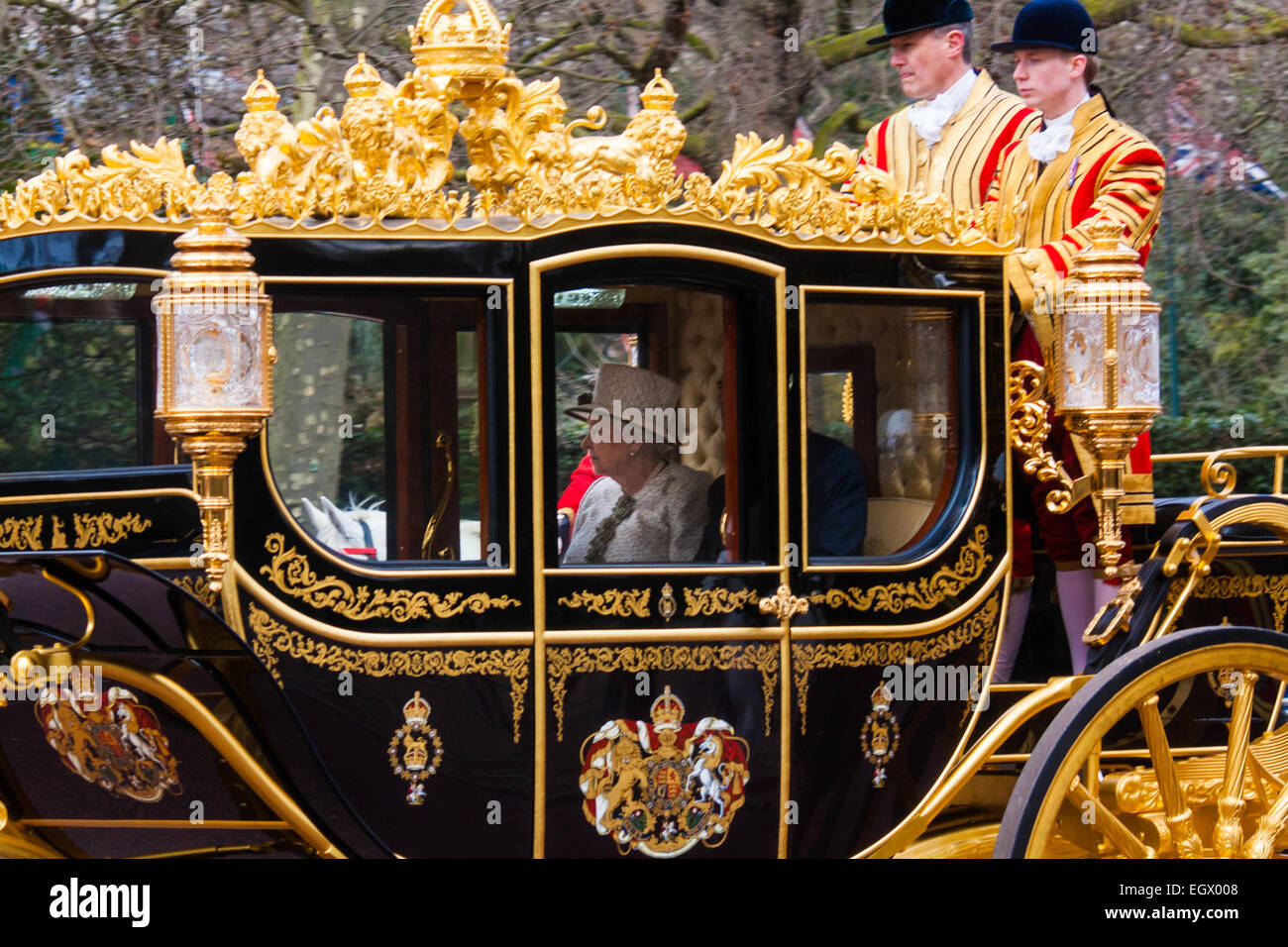 London, UK. 3rd March, 2015. Mexican President Enrique Pena Nieto travels with Her Majesty The Queen and other members of the Royal Family by State Carriage along the Mall towards a luncheon at Buckingham Palace after a ceremonial welcome at Horseguards Parade. PICTURED: Her Majesty the Queen, Elizabeth II travels with Mexican President Enrique Pena Nieto in the State Carriage. PICTURED: Her Majesty the Queen, Elizabeth II travels with Mexican President Enrique Pena Nieto in the State Carriage. Credit:  Paul Davey/Alamy Live News Stock Photo