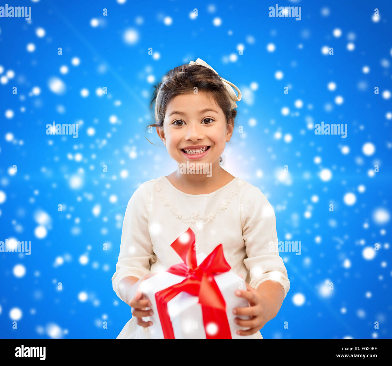 smiling little girl with gift box Stock Photo - Alamy