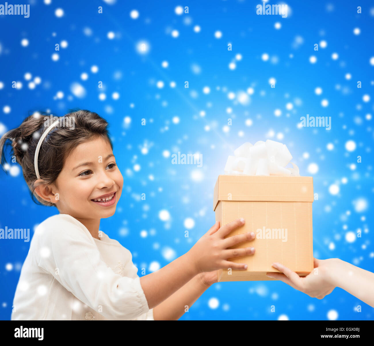 smiling little girl with gift box Stock Photo - Alamy