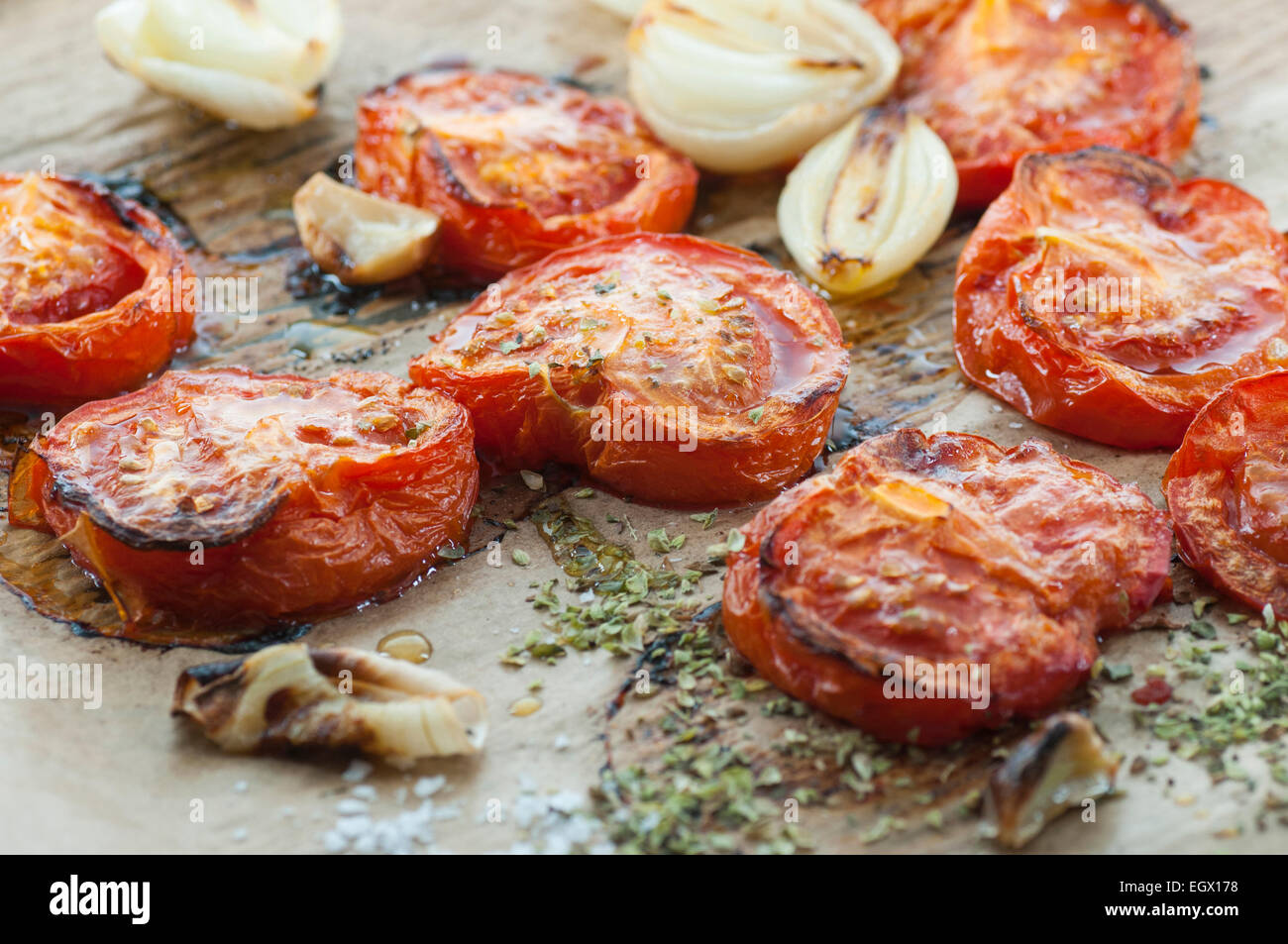Oven roasted tomato, onion and garlic spiced with oregano and sea salt. Stock Photo