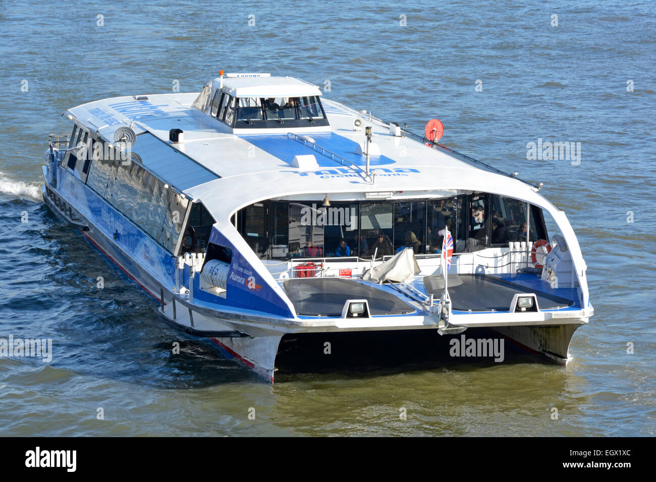 Aerial roof view Thames clipper high speed catamaran commuter and tourist river bus public transport service River Thames City of London England UK Stock Photo