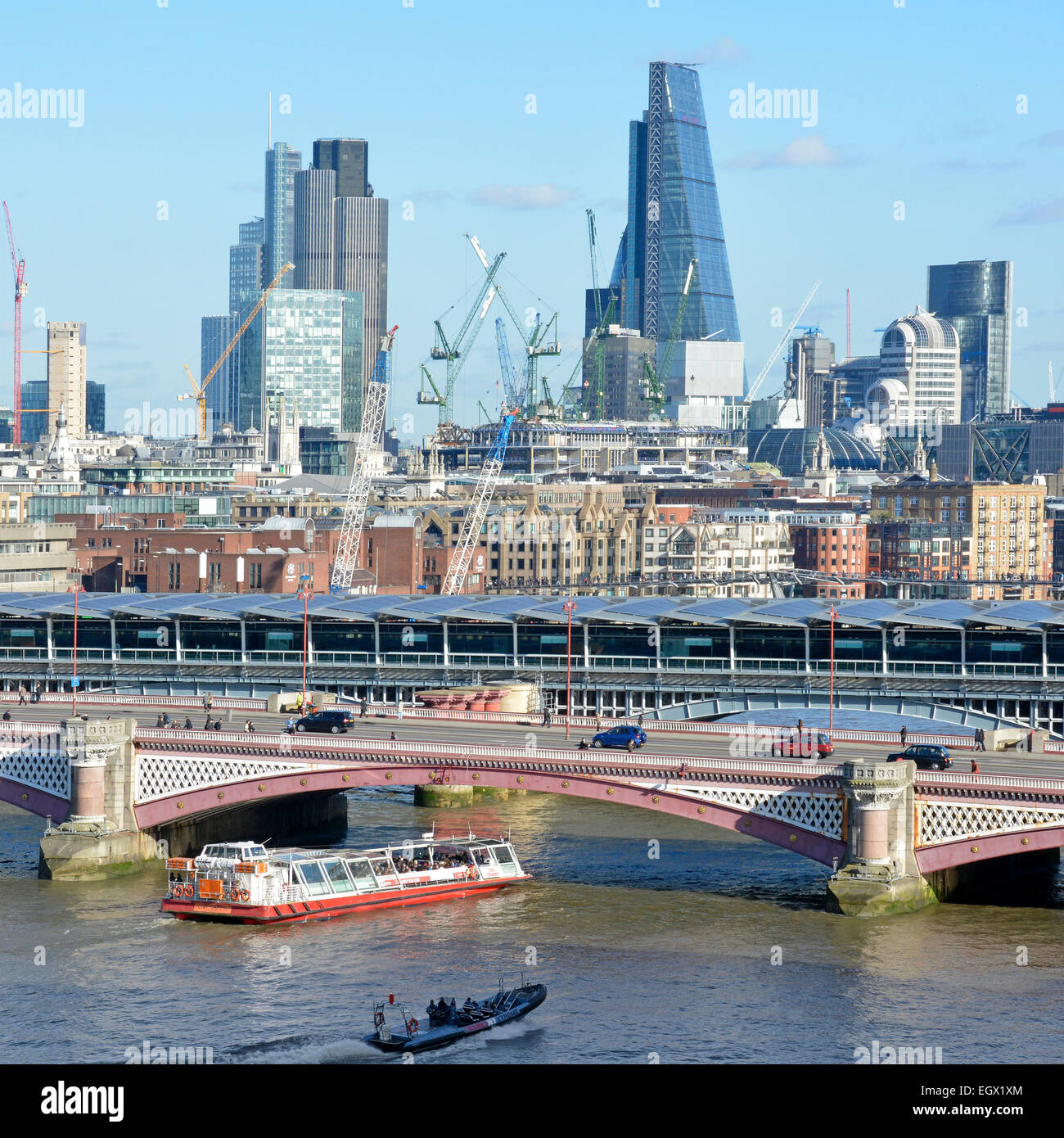 Blackfriars road Bridge & the solar panel roof of the remodelled Blackfriars train station above the river Thames & City of London skyline beyond UK Stock Photo