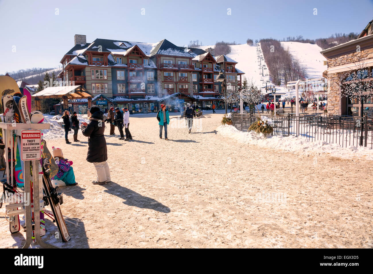 Ontario's Premier Ski Resort  Blue Mountain in Collingwood;Ontario;Canada and the 'Village' in the Winter & many people skiing Stock Photo