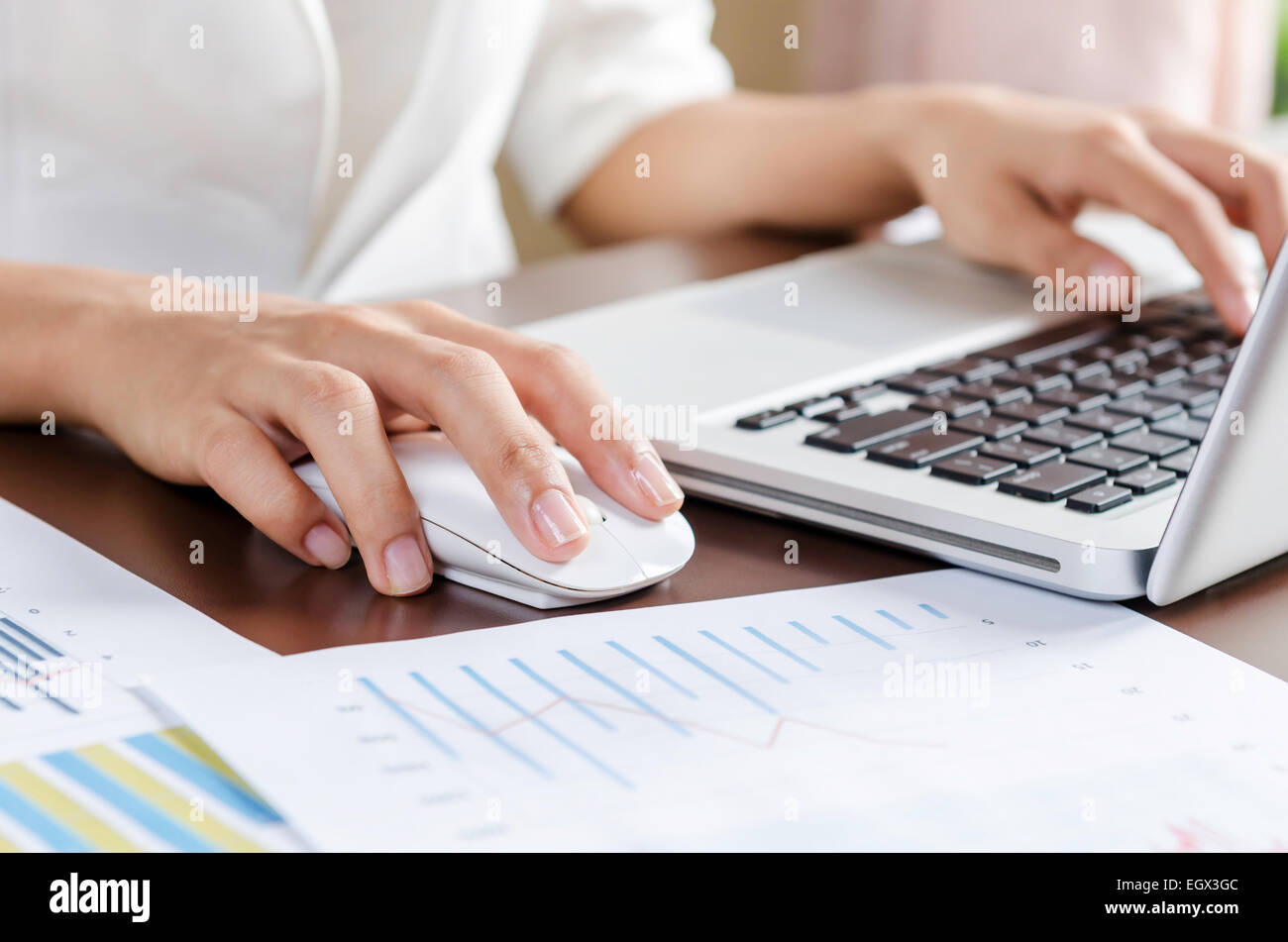 Working with computer Stock Photo - Alamy
