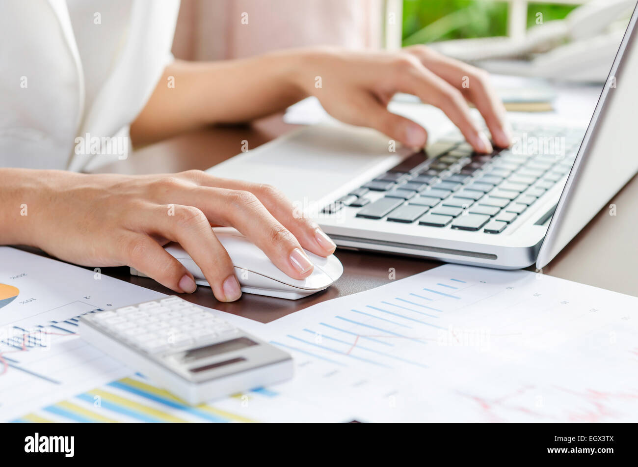 Working with computer Stock Photo - Alamy