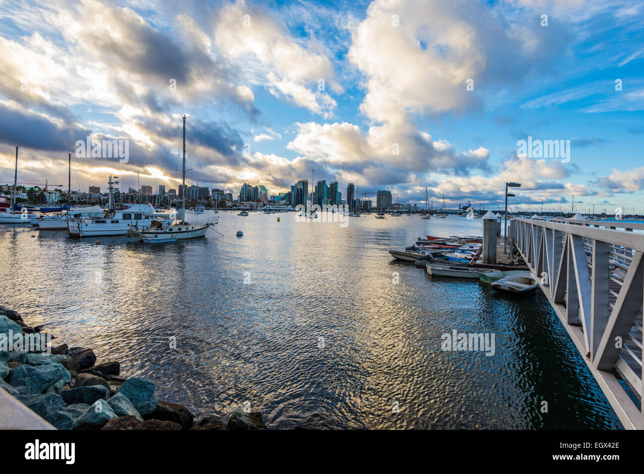 View of a small boat dock and San Diego Harbor on a cloudy morning. San