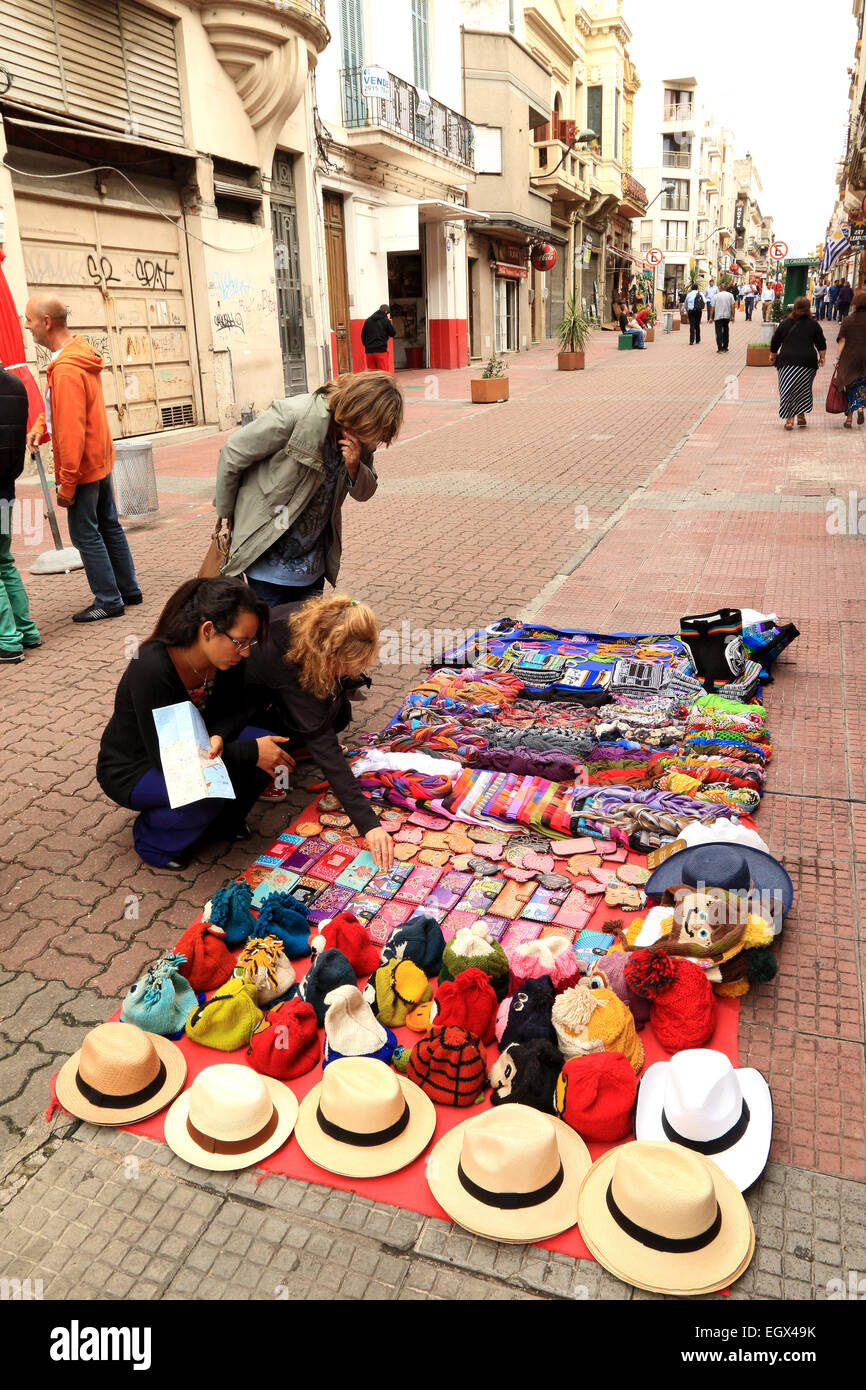 Montevideo Uruguay. Street vendor with tourists in old town Montevideo. Stock Photo