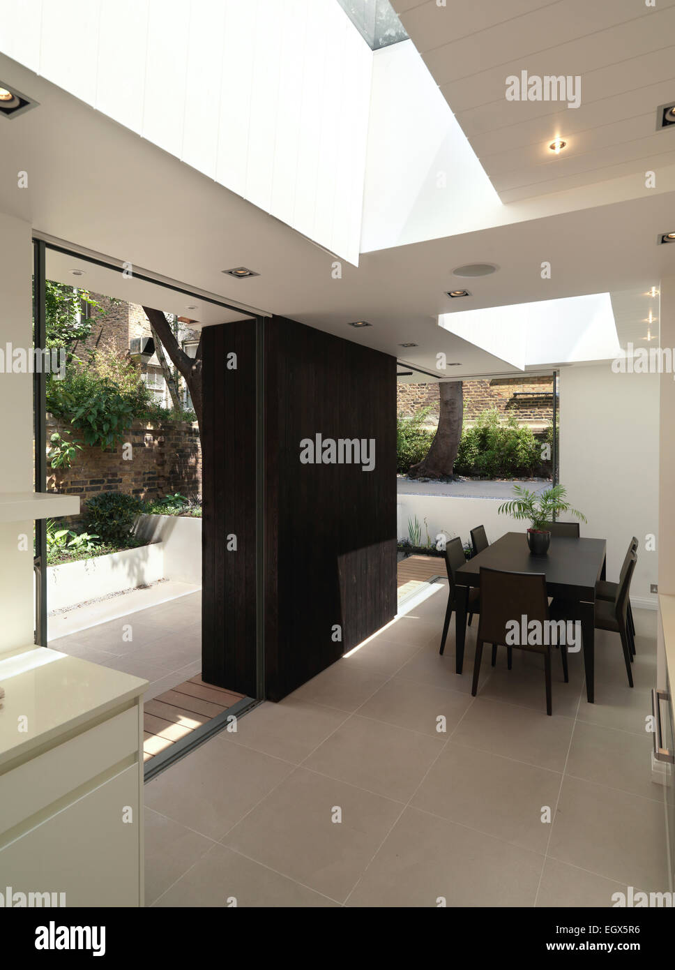 Table and chairs in modern dining room, UK home Stock Photo Alamy