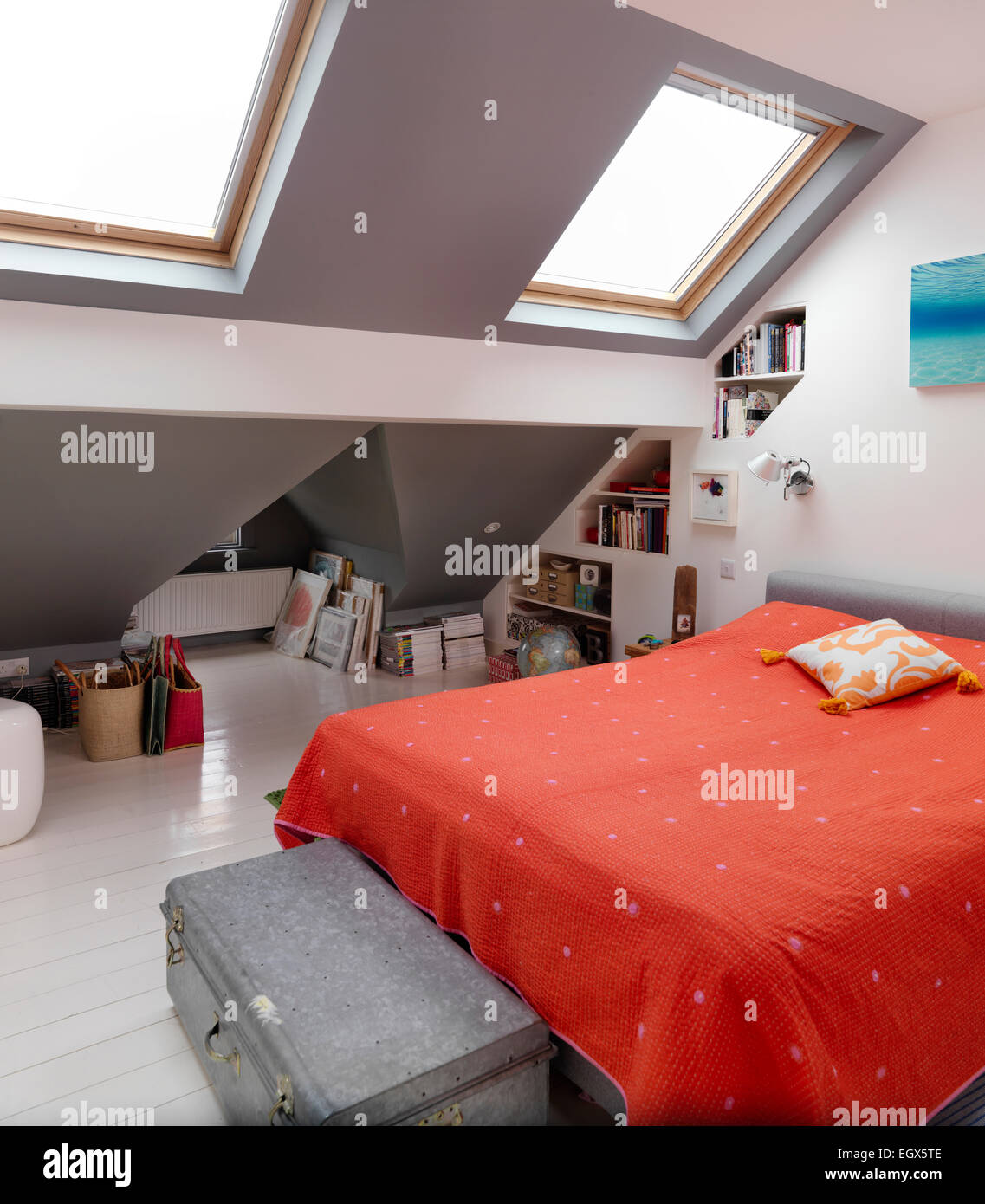 Attic bedroom with Velux windows, UK home Stock Photo