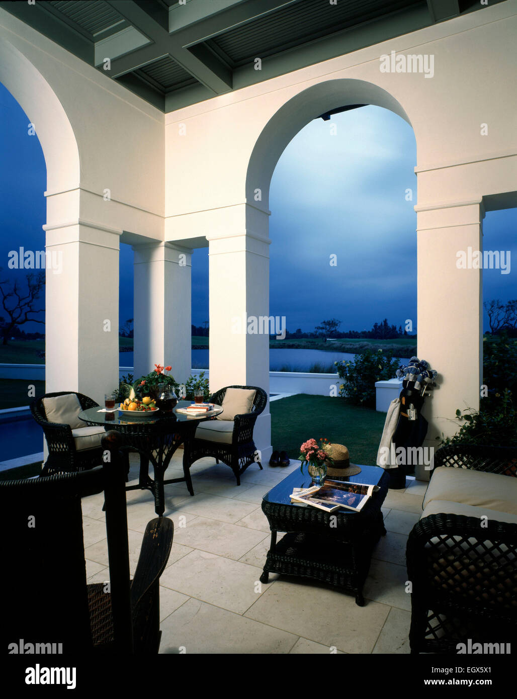 Seating on shaded terrace of house Stock Photo Alamy