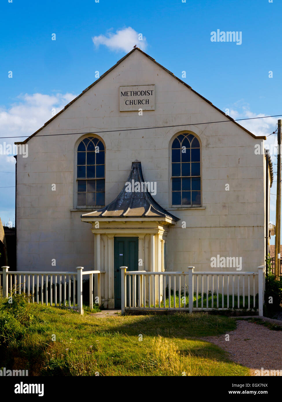 Traditional Methodist Church with door and arched windows in West Bay Dorset south west England UK Stock Photo