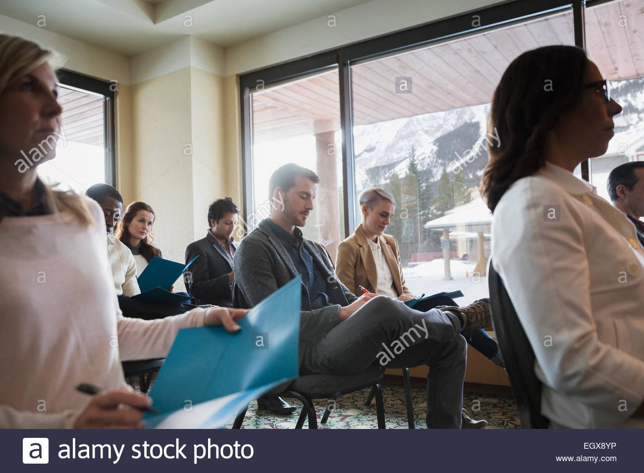 Business people sitting in conference meeting Stock Photo - Alamy