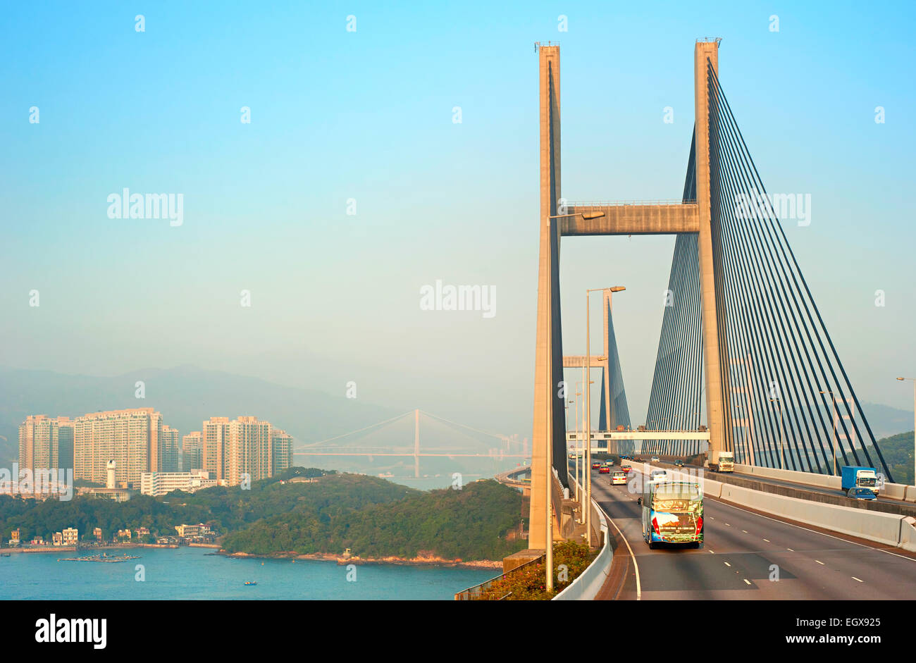 Traffic on Tsing Ma bridge at sunset. Hong Kong Stock Photo