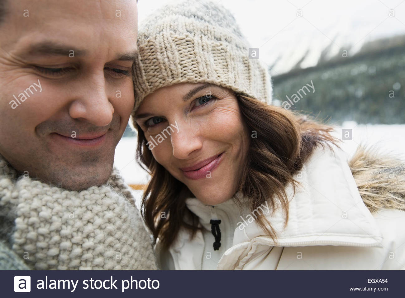 Portrait of smiling couple wearing warm clothing Stock Photo