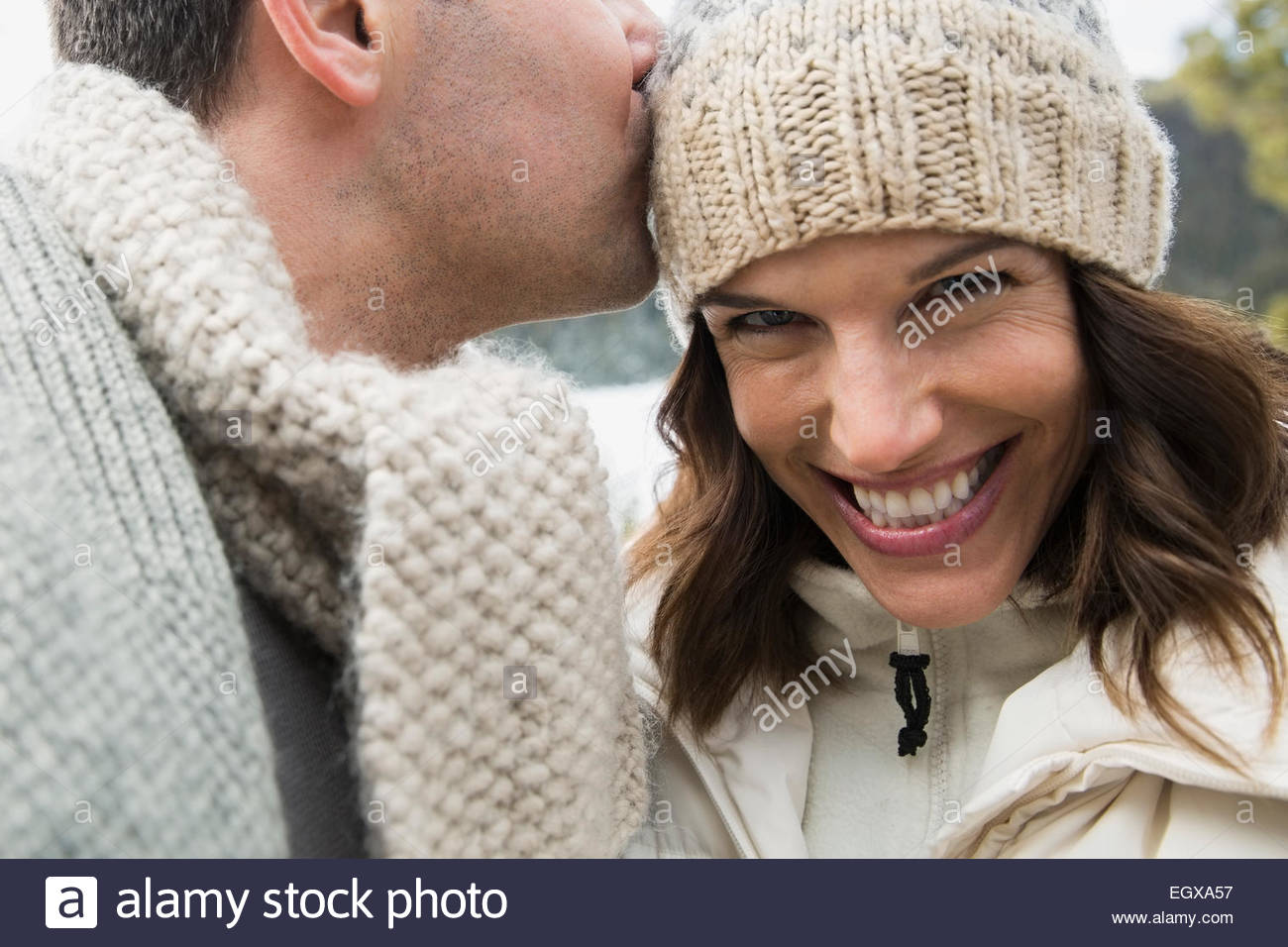 Portrait of enthusiastic couple wearing warm clothing Stock Photo