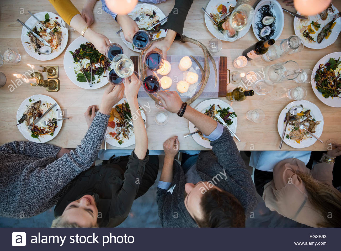 View from above friends toasting wine glasses Stock Photo