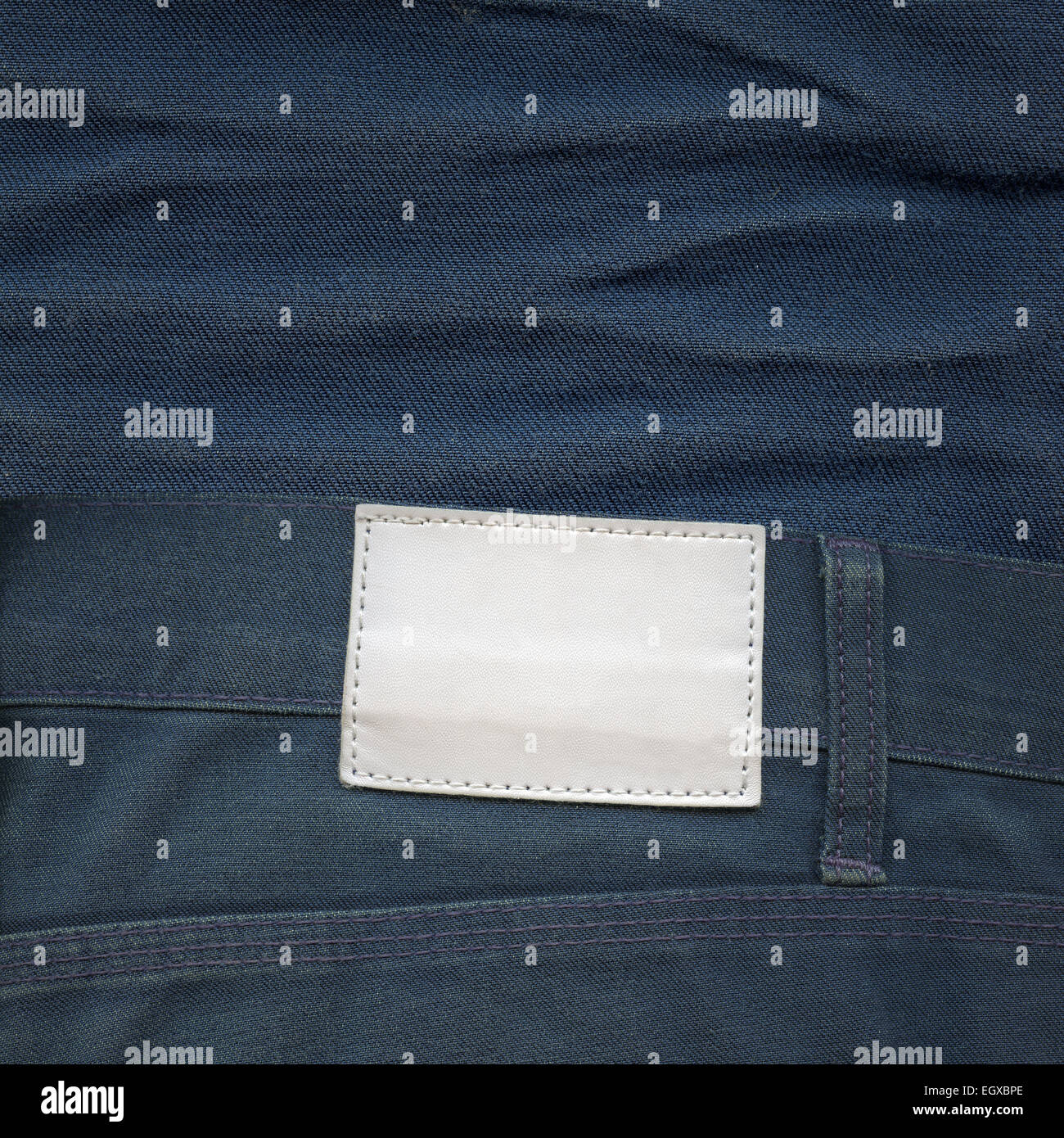 Blank leather label on jeans Stock Photo - Alamy
