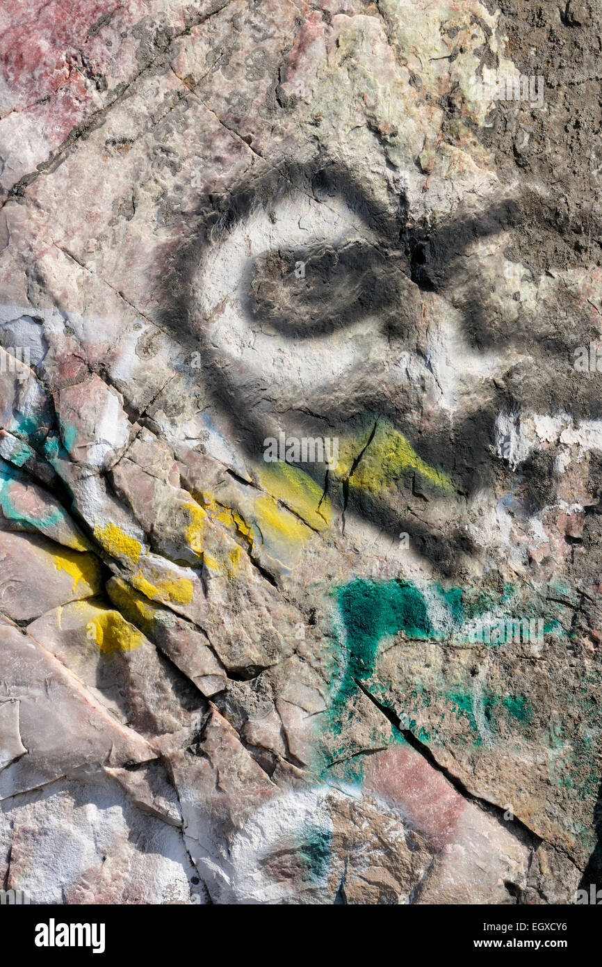 Spray painted graffiti on limestone cliff Willisville Ontario Canada Stock Photo