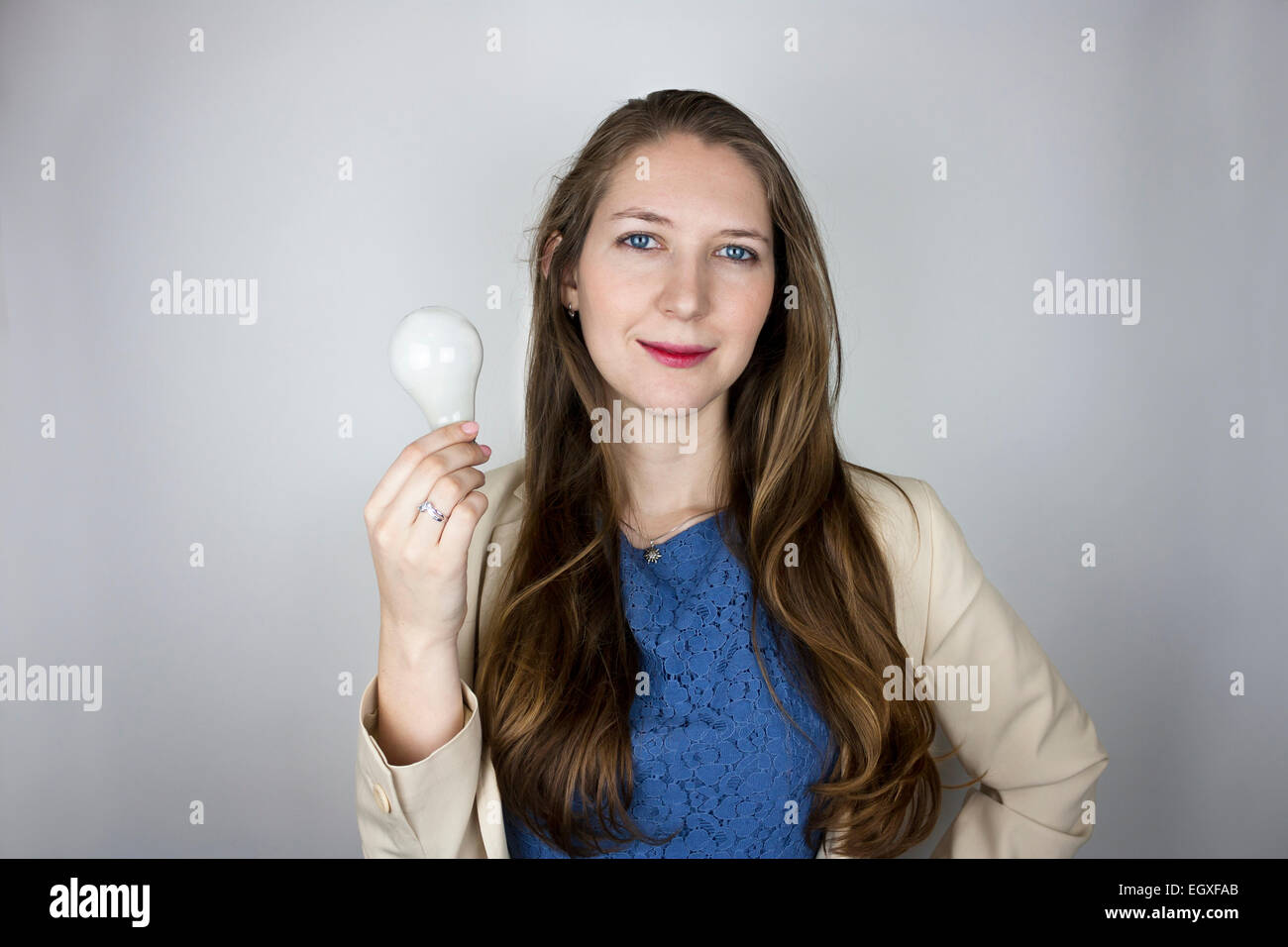Beautiful woman in blue top hi-res stock photography and images - Alamy